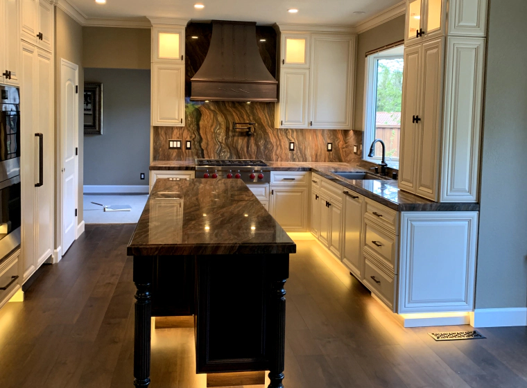 custom marble kitchen with under ciounter lights